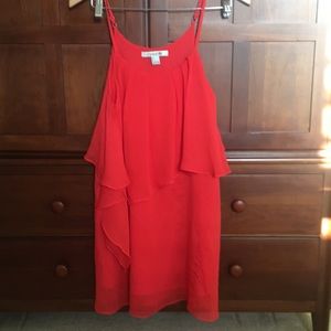 Red-orange spaghetti strap dress with ruffle